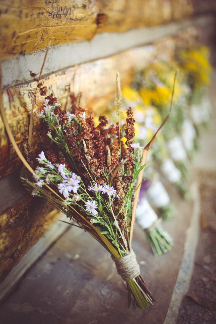 Since Kelsey and Joey had a small floral budget, the bridesmaids spent the day before picking wildflowers from Joey's family's property for the bouquets and centerpieces. "Surprisingly, they turned out better than if I had gone to a florist," Kelsey says.