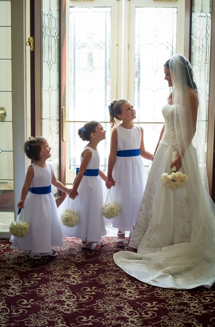 Matching Flower Girls with Navy Sash and Kissing Balls