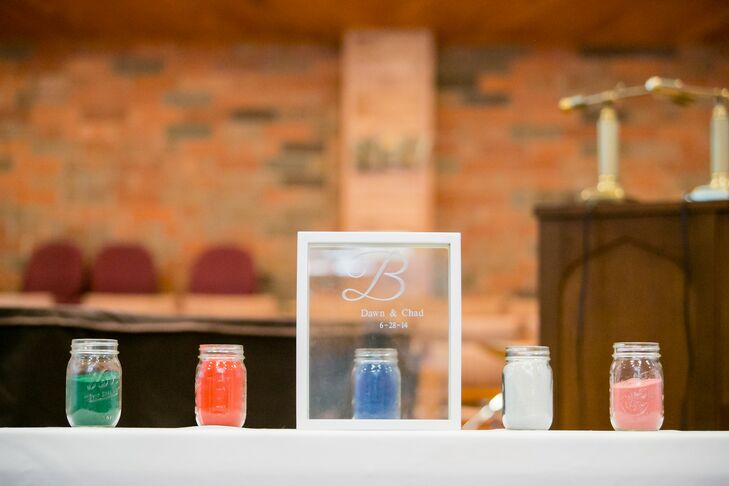 Dawn and Chad partook in a sand unity ceremony at their church union.