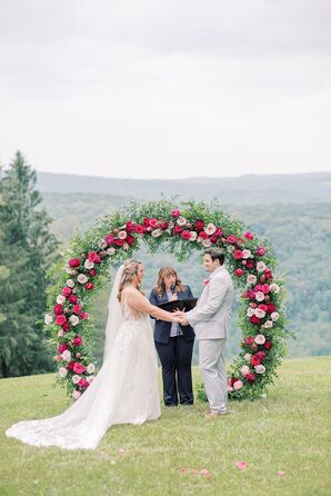 Mountain Wedding Ceremony With Red Rose Arch at Holimont Ski Resort in Ellicottville, New York