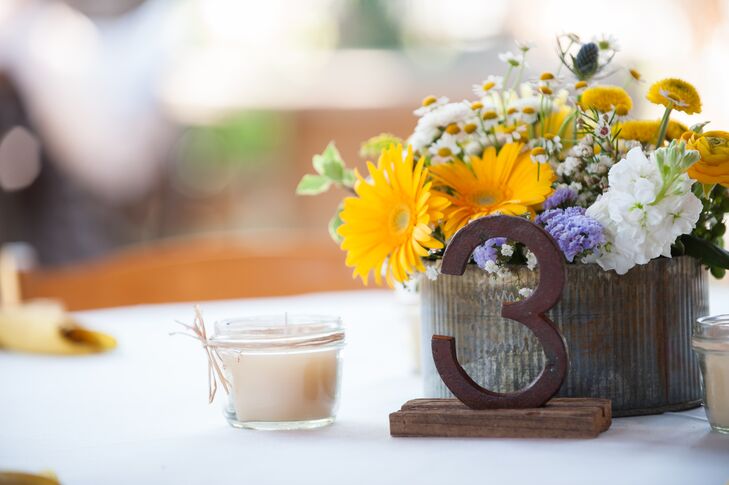 Sarah and Bruce's table numbers looked like rustic metal cattle brands, which couldn't have been better for their truly Texas wedding.
