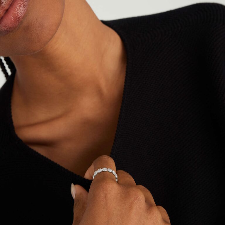 clustered diamonds in circle design on white gold band