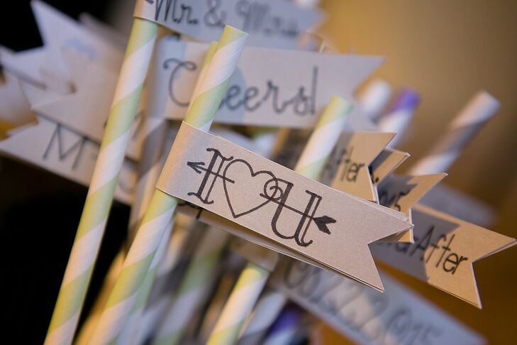 Among the many DIY touches to Mary and Joseph's wedding were flags on the cocktail straws. Small flags with romantic taglines were fastened to green- and white-striped straws.