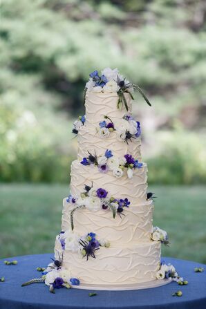 Decorative Buttercream Cake with White and Purple Flowers