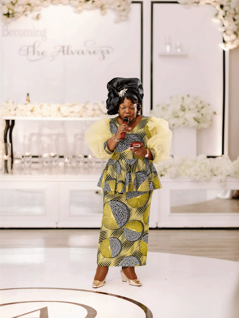 Maid of honor giving speech at wedding