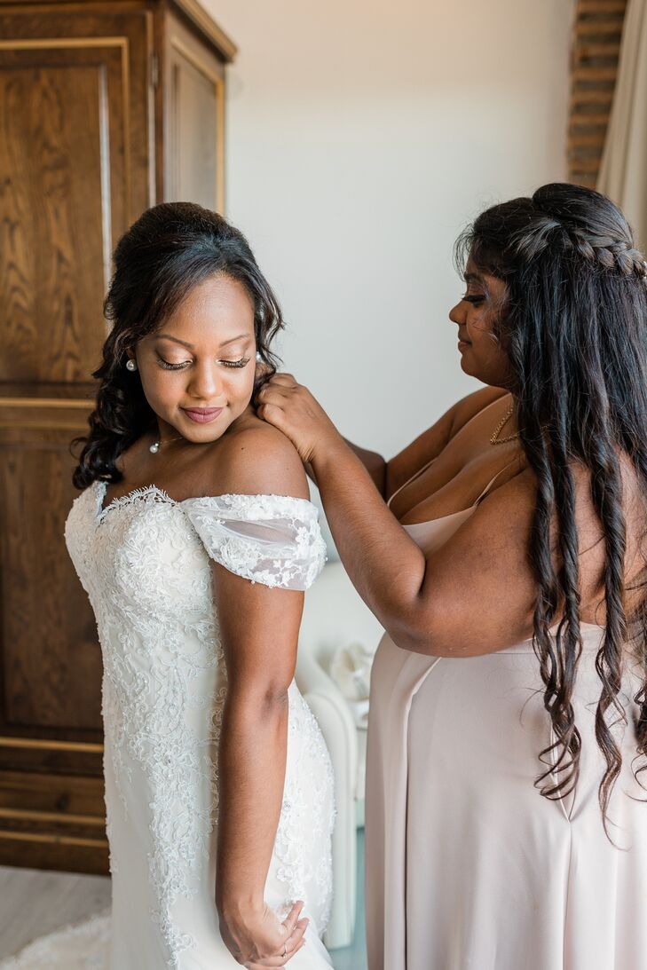 Bride Getting Reading in Off-the-Shoulder Wedding Dress