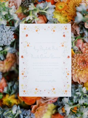 Unique, Flower-Themed Invitation Suite With Orange and Yellow Flowers