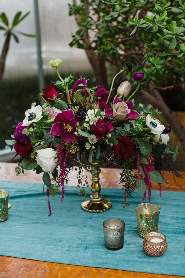 Centerpiece with amaranths, orchids and anemone blooms