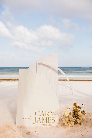 Modern Wedding Signage Featuring Neutral Color Palette on the Beach