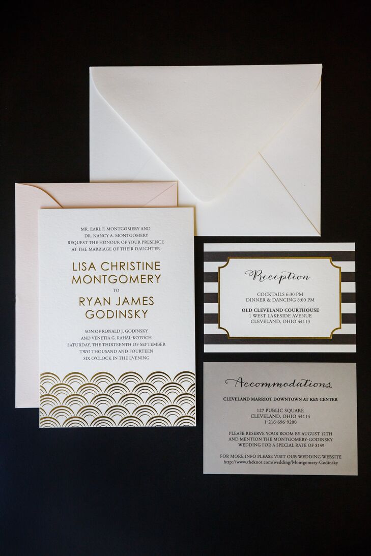 Wedding invitations were black and white with an art deco design. The invitations were designed by OliveINK.