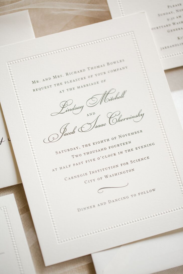 Lindsay and Jake's traditional, calligraphed wedding invitations with pearl beading borders were provided by Write For You.