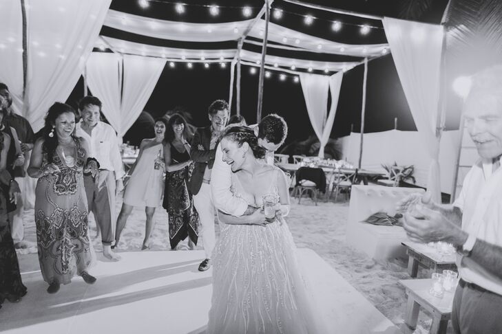 Danielle and Jason’s dance floor was light and casual, set up on the beach under loose linen drapery and bistro lights. They had a DJ play the best of '90s hip-hop, '70s soul and the entire Michael Jackson catalog.