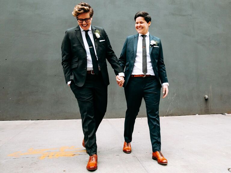 Same sex couple wearing gender neutral wedding attire