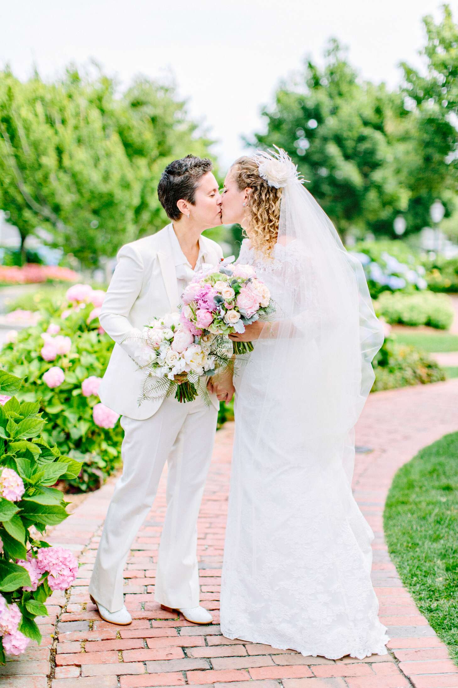 White Gucci Suit and L'Fay Bridal Gown