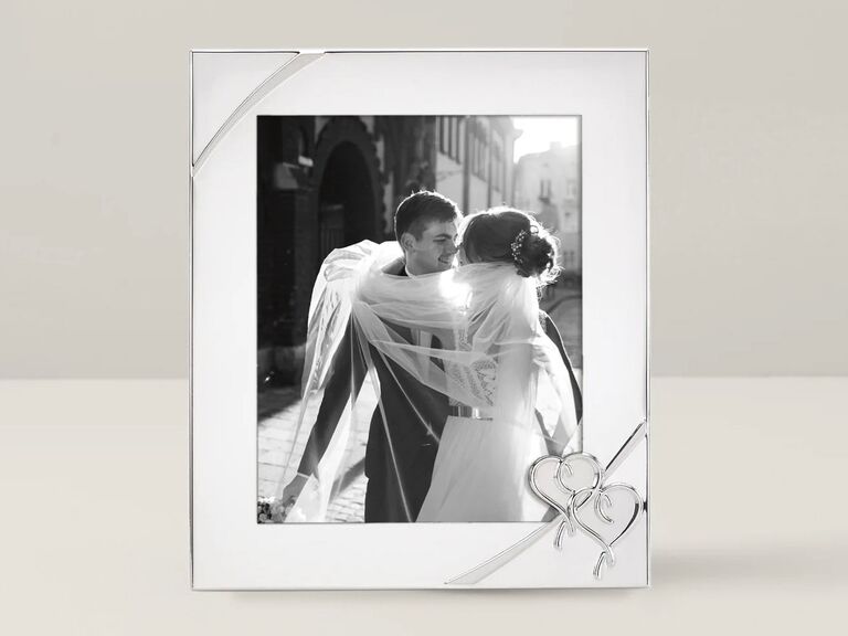 Silver frame with heart design in bottom right corner engagement gift from parents