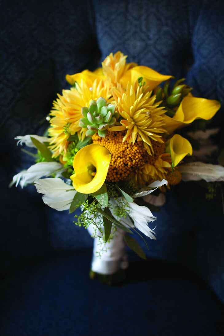 Yellow dahlias, calla lilies and craspedia made up Amy's textured bouquet.