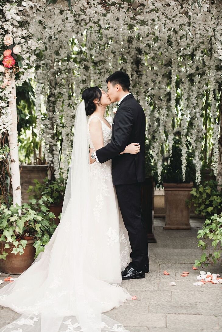Wedding Ceremony First Kiss at Planterra Conservatory in Detroit, Michigan