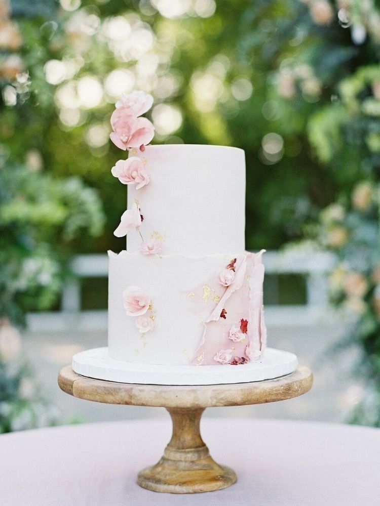 two-tier spring wedding cake with sugar flower sweet peas