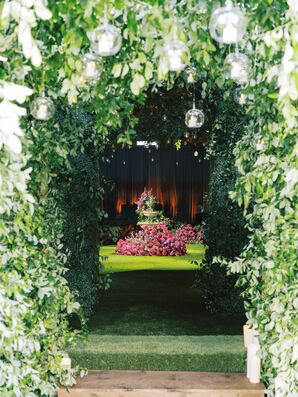 Greenery Tunnel Entryway With Hanging Candles