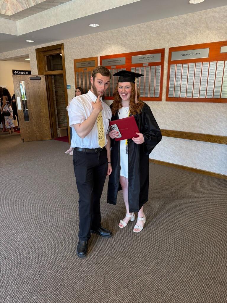 Lizzie graduates Malone.