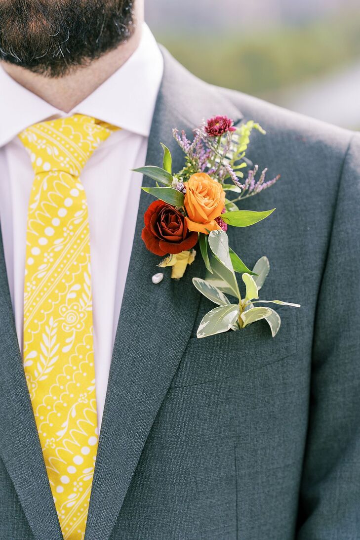 Yellow Tie and Orange Boutonniere