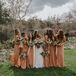 Bridesmaids in Custom Rust-Orange Gowns With Slit