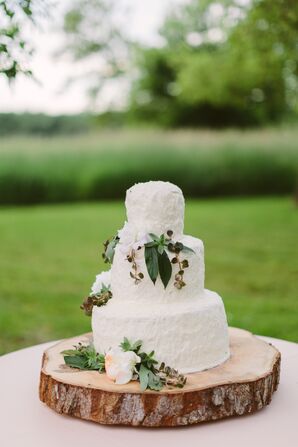 Ivory Cake on Wooden Slab Stand