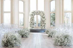 Lush Aisle Decor With Floral Wedding Arch