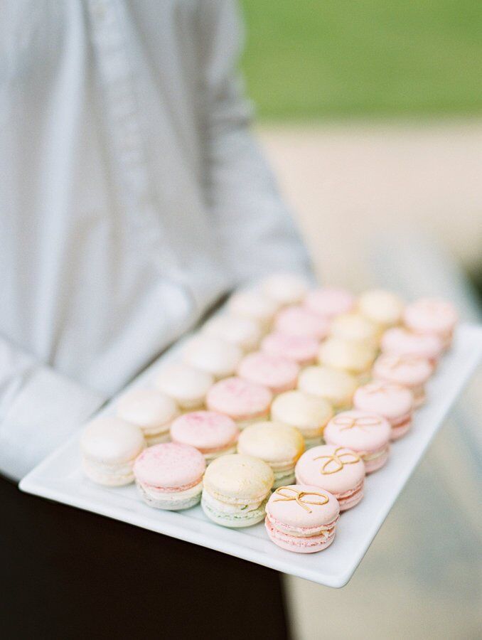 Pastel macarons were passed to guests as a sweet treat.