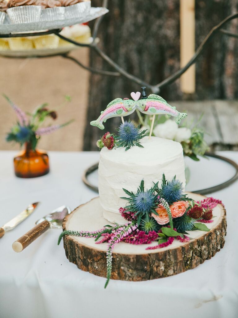 Kissing rainbow trout cake toppers. 