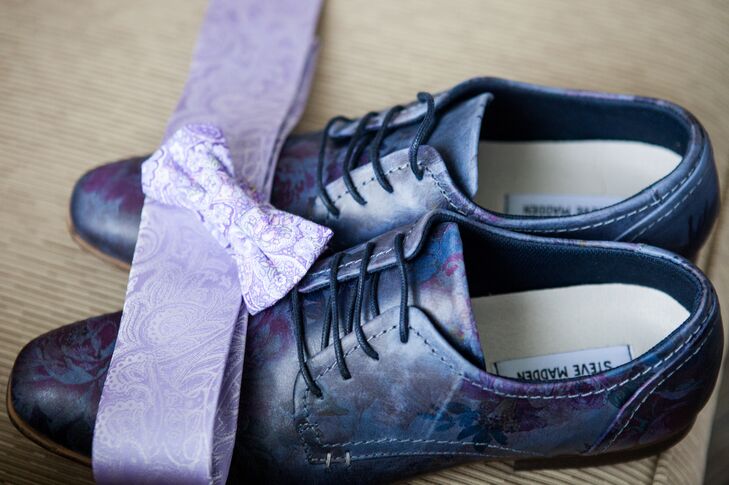 The groom wore a lavender paisley tie and Steve Madden Jakke shoes in floral blue. The combination popped against the groom's sand-colored suit and vest with mint suspenders.