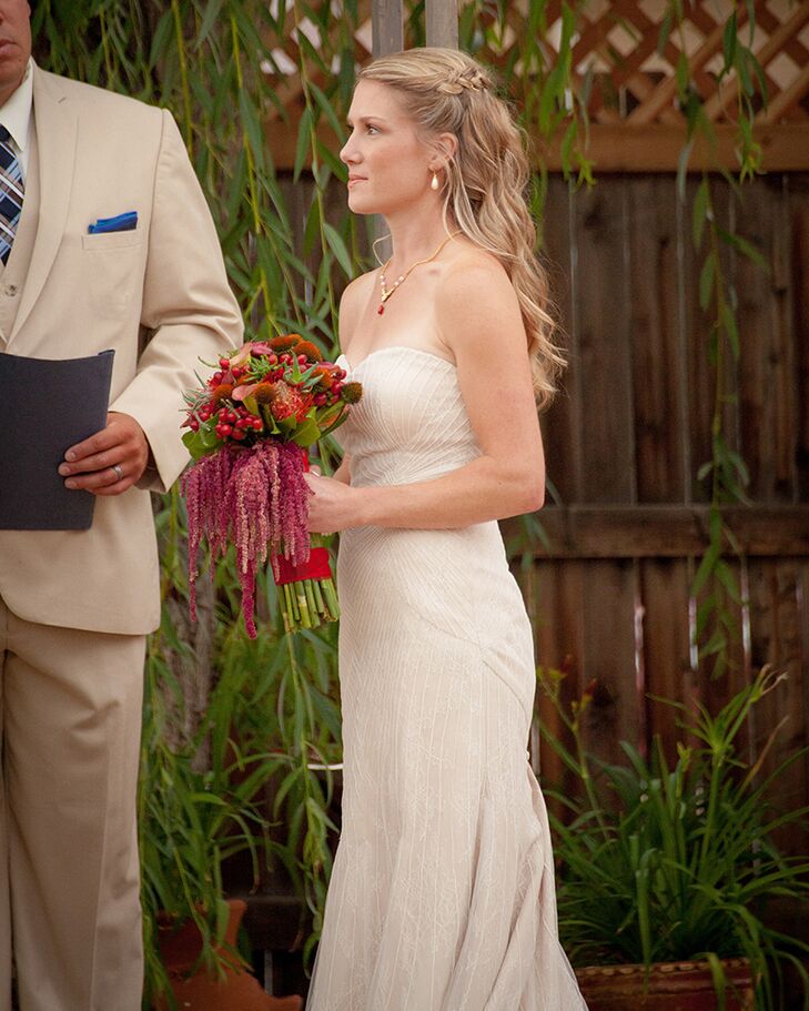 “I had Fiori di Flavio make my bouquet, which had beautiful red pin cushion proteas, hanging red amaranthus, eucalyptus foliage and fresh green bamboo handle,” Sharon says.