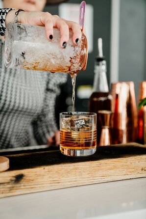 Bartender Mixing Cocktail at Wedding