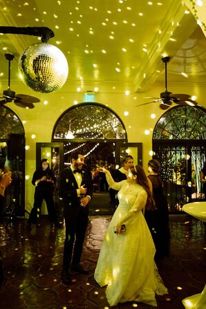 Couples Dancing Under Disco Ball at Villa Woodbine in Miami, Florida