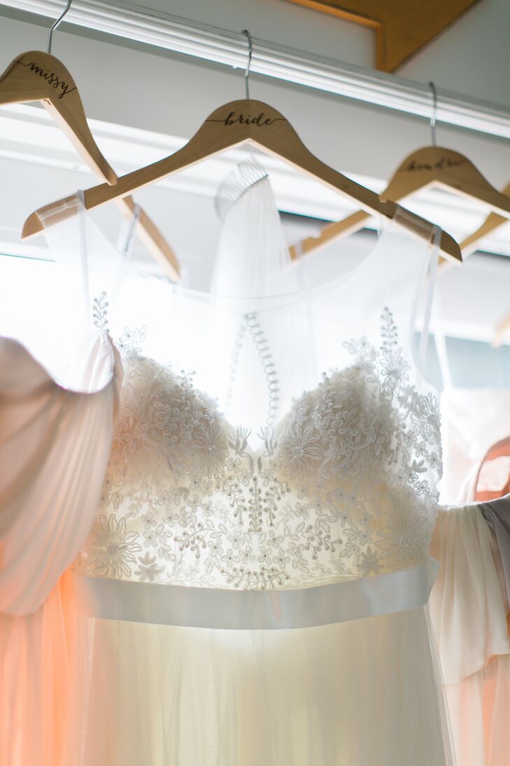 Jenn wore the a hand-beaded silk charmeuse slip dress with a bateau illusion net neckline by Watters.