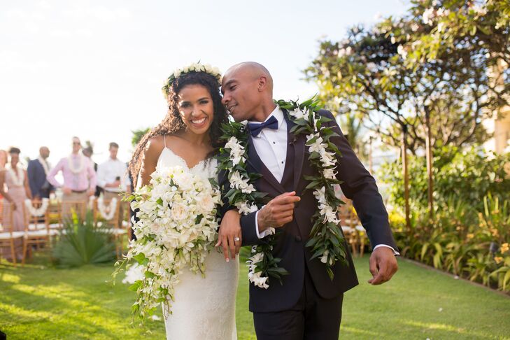 “Even before we won a dream wedding in Hawaii, I knew I wanted to capture a mixture of boho, elegance, grace and lace," says Bethany, who wore a Katie May gown and a white blossom flower crown.