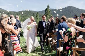 Couple Recessing Under Cascade of Rose Petals at Martis Camp in Truckee, California