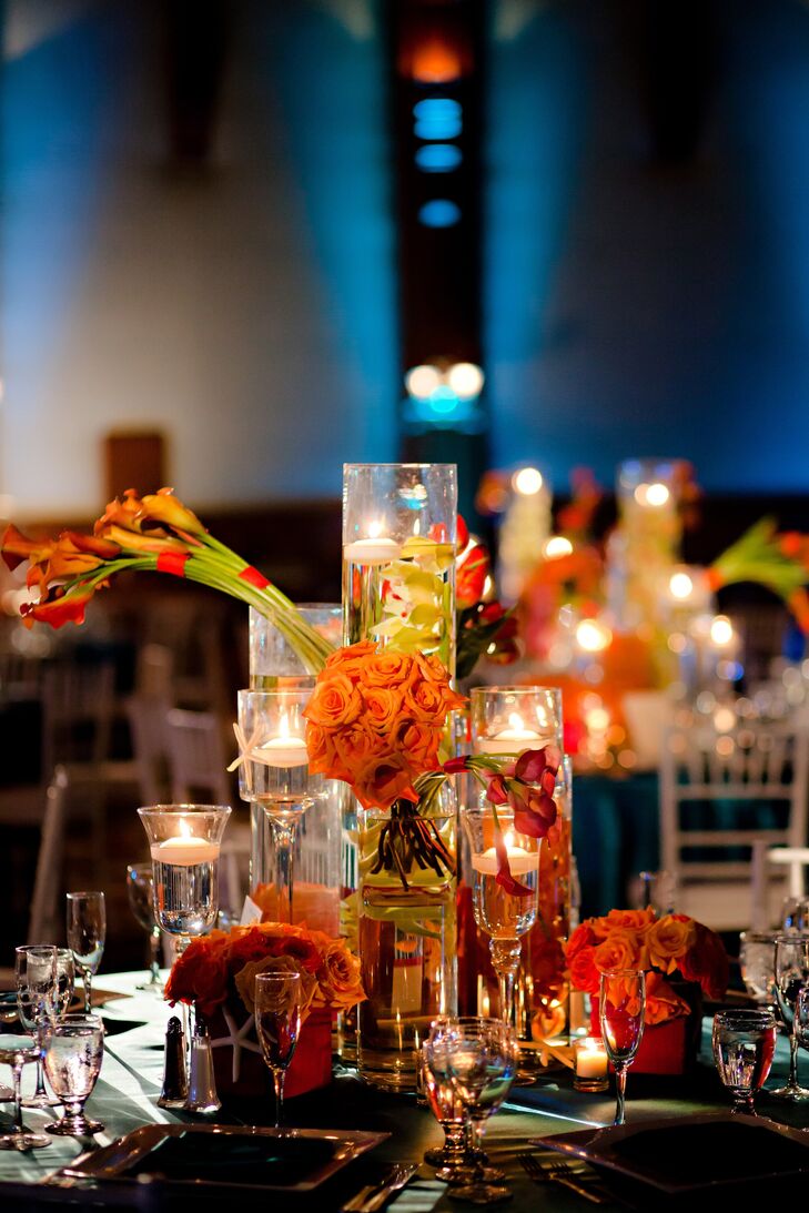 High and low centerpieces were filled with manzanita branches, roses and orchids.