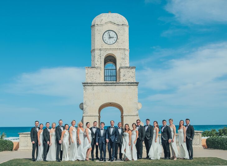 Grooms in Deep Blue Tuxedos, Groomsmen and Groomswomen in Pale Blue Gowns