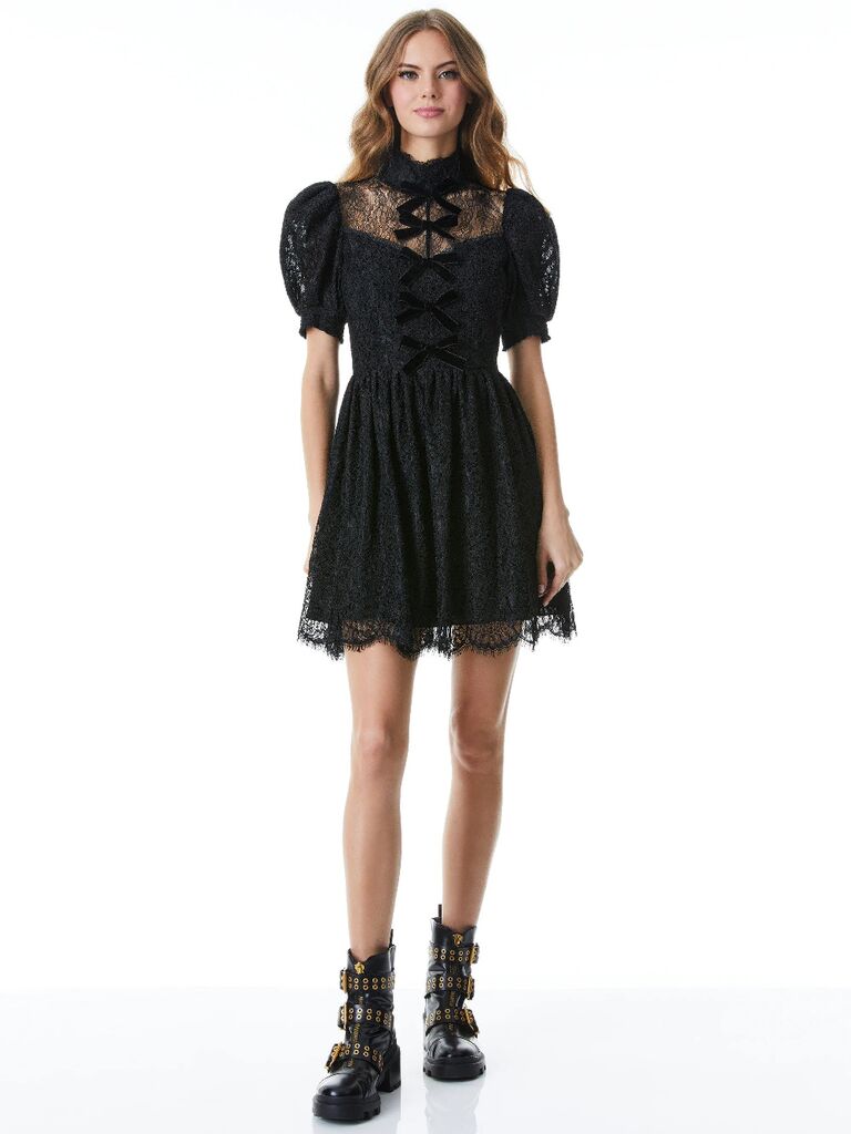 Black lace mini dress with bows and puff sleeves