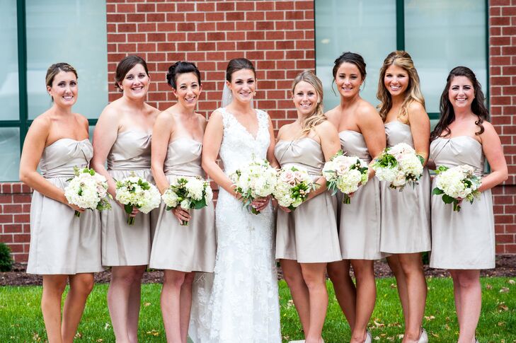 Christina wanted to make sure that her accents were neutral, because her venue's carpet and styling was very blue. Her bridesmaids wore tan Jenny Yoo dresses to the celebration.