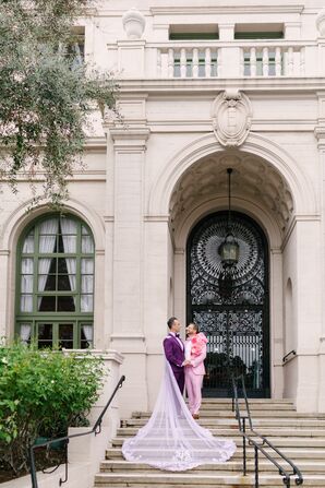 Groom in Purple Tux, Long Tulle Cape With Groom in Pink Tux, Floral Lapel at Historic Venue