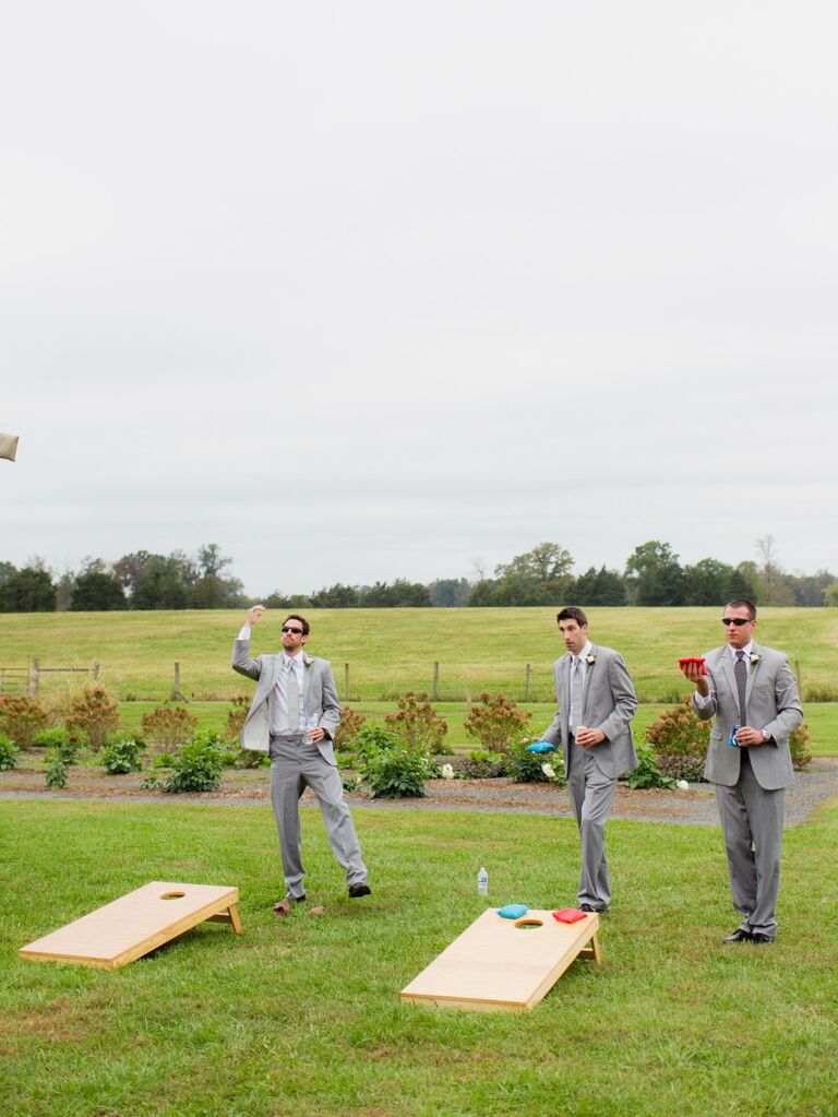 Lawn games during cocktail hour at a small wedding. 