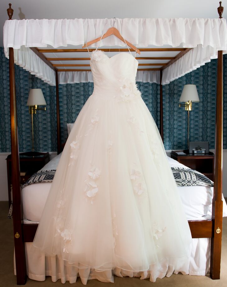 Kristin found her bridal gown at Clever Bride Consignments.  She fell in love because it had the wow factor she had always wanted.