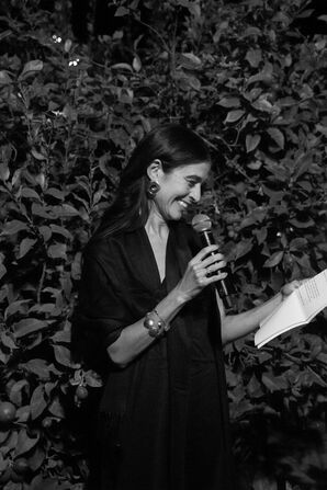 Black and White Photo of Woman Making a Speech at Intimate, Alternative