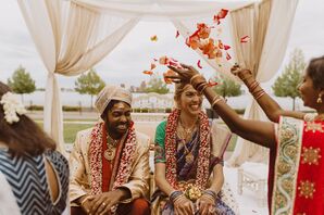 Flower Petals Tossed on Couple During Hindu Wedding Ceremony