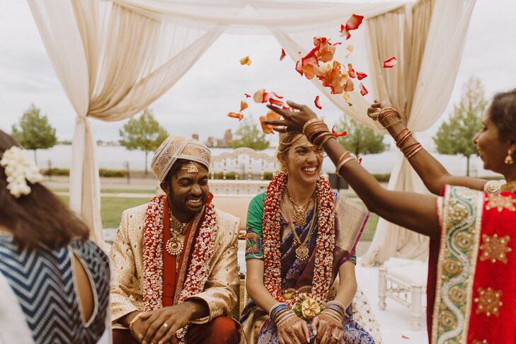 Flower Petals Tossed on Couple During Hindu Wedding Ceremony