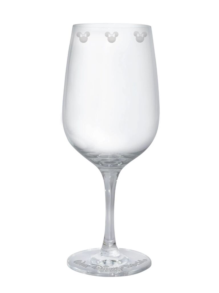 Stemmed glass with small Mickeys around top