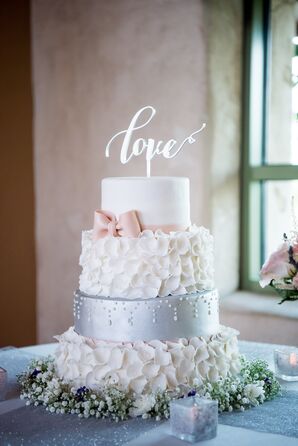 White Multitiered Cake With 'Love' Topper