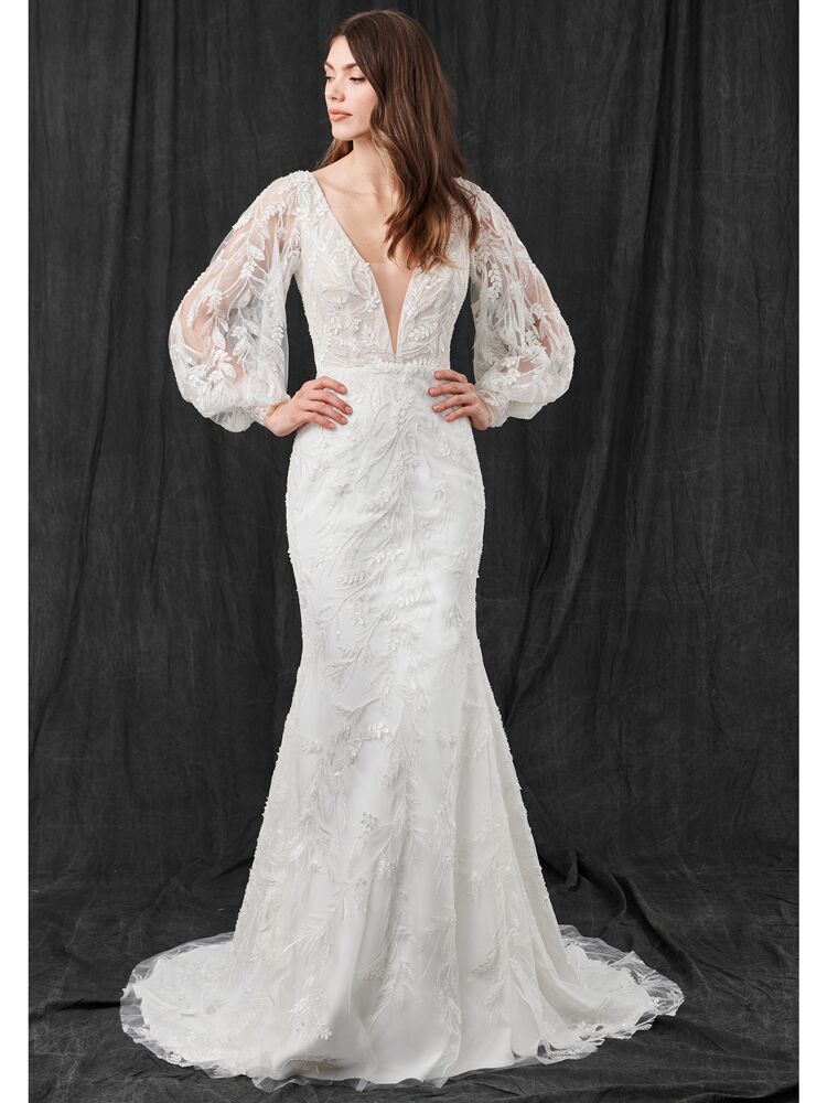 Kelly Faetanini fit-and-flare wedding dress with puff sleeves